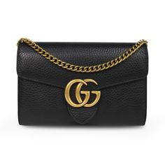 Gucci 'Marmont' wallet on chain in black pebbled leather with gold hardware 'GG' logo on the front and a removable long chain strap. Features front flap magnetic button closure and multiple card slots, 4 main compartments, and a zip pocket in the interior. Includes dust bag. Brand = Gucci Condition = 8/10, Very good, light tarnishing to chain strap Dimensions = 8" x 5" x 1.5" Strap Drop = 21" Material = Leather Hardware = Gold SKU = 23762-1 Gucci Marmont Wallet On Chain, Gucci Marmont, Wallet On Chain, Gg Logo, Leather Hardware, Black Pebbles, Handbag Wallet, Wallet Accessories, Bag Brand