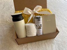 a gift box with coffee, tea and other items