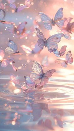 many butterflies are flying over the water in this artistic photo, which appears to be floating