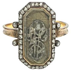 The octagonal ring features initials made out of silver and set with rose diamonds. The initials are underlaied with fabric and covered by the original bevelled glas in an octagonal gold mount. The gold mound is surrounded by a silver border set with rose diamonds. The ring shaft is DECORATED This French ring is inscribed with the date 4 Mai 1809 and the two names A de St Didier L de ST Didier. We are probably looking at a ring commemorating a wedding. The outside of the shank shows an impressed Antique Enamel Ring With Rose Cut Diamonds, Luxury Antique Ruby Ring With Rose Cut Diamonds, Antique Pink Rose Cut Diamond Jewelry, Ornate Rose Cut Diamonds Jewelry Collectible, Antique Diamond Intaglio Jewelry, Antique Gold Ring, Antique Gold Rings, Cabin Door, Rose Diamond