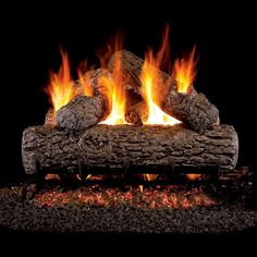 an image of a fire burning in the fireplace with flames coming from it's logs