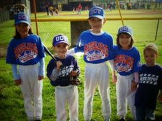 the young baseball players are posing for a photo