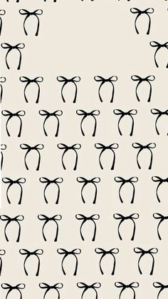 black and white bow tie pattern on a wallpapered background with text that reads, ` `