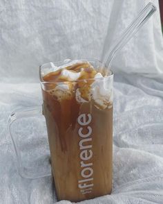 there is a beverage with ice and caramel in it