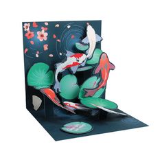 a pop up card with koi fish and lily pads