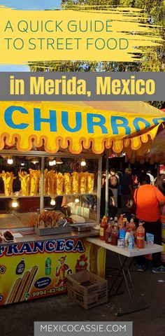 a food stand with the words in merida, mexico churros on it