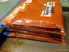 three bags of food sitting on top of a counter