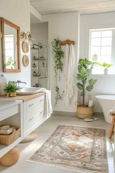 a bathroom with a rug, sink and bathtub in the center is decorated with potted plants