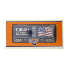 an orange and white box with two cars in it's packaging, one has the american flag