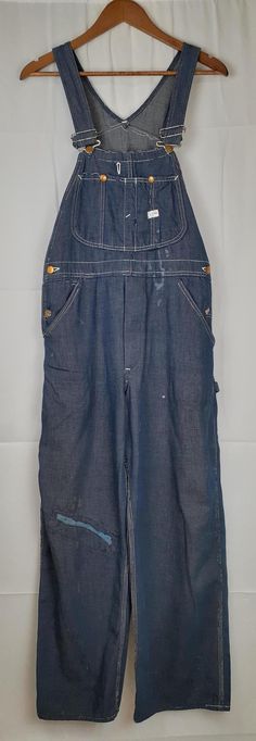 Vintage Lee Denim overalls, with great character, from around the 1960s. They are well worn, and have been repaired, but have a lot of life left!  Length: 58" Inseam: 28" Hip: 38" Vintage Denim Overall Jumpsuit, Vintage Medium Wash Washed Overalls, Vintage Denim Overalls In Medium Wash, Vintage Denim Blue Jumpsuit With Pockets, Vintage Medium Wash Denim Overalls, Vintage Dark Wash Denim Jumpsuit With Straight Leg, Vintage Dark Wash Straight Leg Denim Jumpsuit, Vintage Bib Front Denim Jumpsuit In Medium Wash, Vintage Denim Blue Bib Front Jeans