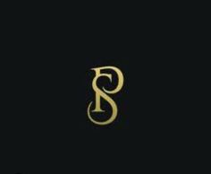 the letter s is shown in gold on black