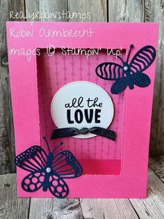 a pink frame with two butterflies on it and the words all the love written in black