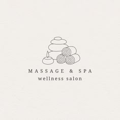 the logo for massage and spa, which is designed to look like a stack of stones