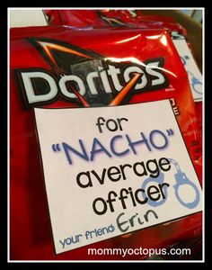 a bag of nachos with a sign on it that says doritos for nacho average officer