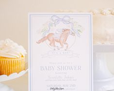 a baby shower with cupcakes on the table