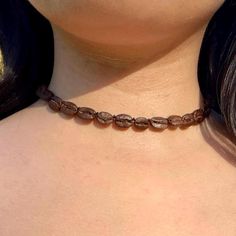 Our real coffee bean choker necklace is handmade jewelry made from hand picked coffee beans sourced from various Latin American countries. Each coffee bean is hand drilled and strung by hand. This unique use of coffee  beans makes a beautiful and simple statement piece. They're very lightweight and comfortable to wear. The minimalist design complements every look. Easy to put on with your favorite jeans or dressed up for a night out.  This would be just perfect as a birthday gift, anniversary gift, Christmas gift, Mother's day gift, Father's day gift, Valentine's day gift or a surprise gift for anyone you know that loves coffee beans! DETAILS - Organic Coffee Beans - Flexible Cord - Smells Amazing  - Looks Amazing   Your item will arrive carefully packaged, perfect for giving to yourself, Organic Coffee Beans, Real Coffee, Organic Coffee, Coffee Bean, Espresso Coffee, Choker Necklaces, Latin American, Jewelry Companies, Surprise Gifts