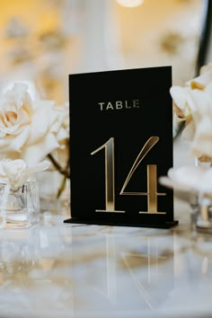 "Welcome to our elegant Black Wedding Table Numbers! These modern table signs are the perfect addition to any wedding decor, adding a touch of sophistication and style to your reception. Our table numbers are made from high-quality black acrylic and are designed to stand on their own on your wedding reception tables. They feature 3D gold mirror acrylic, bold, numbers that are easy to read, making it simple for your guests to find their seats. And with a classic black and gold color, they're sure to complement any wedding theme or color scheme. Our Black Wedding Table Numbers are also durable and long-lasting, so you can use them for future events or pass them on to friends and family for their own special occasions. They're the perfect keepsake to remember your wedding day and the loved on Black And Gold Wedding Table, Black White Gold Wedding Theme, Table Signs For Wedding, Black Tie Wedding Decor, Black Table Numbers, Black Tie Wedding Reception, Gold Wedding Table Numbers, Black Wedding Table, Wedding Table Number Signs