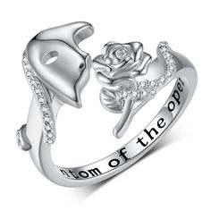 a silver ring with an elephant and rose on it that says, i love you to the