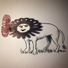 a drawing of a lion with yellow eyes and pink glitters on it's tail