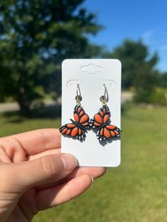 These monarch butterfly polymer clay earrings are lightweight, hypoallergenic and comfortable! They are the perfect gift for a butterfly lover, or a treat for yourself. Every pair handmade in Maine with love. Don't hesitate to reach out to me with any questions or requests. Thank you for shopping! Clay Butterfly Earrings, Butterfly Clay Earrings, Resin Butterfly Earrings, Monarch Butterfly Clay Earrings, Butterfly Clay Necklace, Monarch Butterfly, Butterfly Earrings, Polymer Clay Earrings, Clay Earrings