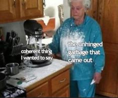 an old woman standing in front of a kitchen counter