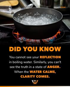 a black pan filled with boiling water on top of a stove