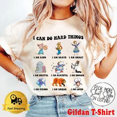 a woman wearing a t - shirt with the words i can do hard things on it