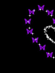 a heart made out of purple butterflies on a black background with the word love written in it