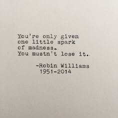 an old typewriter with the words you're only given one little spark of madness