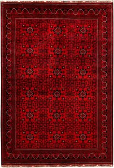 a red rug with an intricate design on the center and sides, in different colors