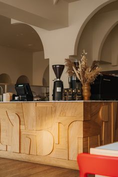 the counter is made out of wood and has various items on it