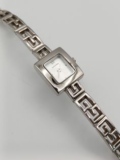 This elegant Sekonda watch features a vintage square dial design and a sleek silver tone, giving it a dainty and timeless look. With its refined style and reliable timekeeping, this watch is the perfect accessory for any occasion. Expertly crafted for durability and precision, it is sure to become a staple in your wardrobe. Fitted with a new battery, in working order.  Has minor wear, please see pictures.  Length: 18cm. Dial width: 1.7cm Pricing depends on uniqueness of the watch, brand name, co Silver Watches Women Classy, Dainty Silver Watch, Vintage Silver Watch, Staple Accessories, Sekonda Watch, Unique Watches, Bijoux Art Nouveau, Silver Watches Women, Art Nouveau Jewelry