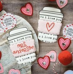 valentine's day cookies are arranged on a table