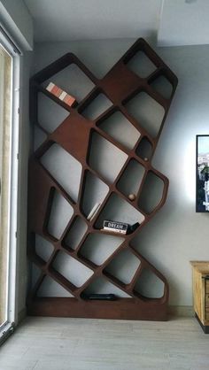 a bookshelf in the corner of a room