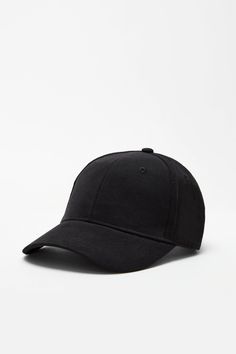 Our baseball hat is the perfect topper for any outfit, and the easiest way to channel off-duty cool or inject athleisure energy into your look. Featuring an embroidered Marcella logo at the back, plus an adjustable strap with a metal clasp to fine-tune your fit. In classic NYC black. | Available in one size. Adjustable fit. Approximately 7.5 inches (19 cm) across, plus approximately 2.75" front bill (7 cm).European Cotton Blend (95% Cotton, 5% Elastane).Spot clean with a damp cloth, or handwash Basic Solid Baseball Cap With Curved Visor, Solid Dad Hat For Baseball Season, Trendy Solid Color Baseball Cap For Everyday, Basic Solid Dad Hat With Curved Visor, Casual Sports Fitted Hat With Adjustable Fit, Casual Adjustable Fit Fitted Hat For Sports, Casual Adjustable Fit Sports Hat, Solid Baseball Cap With Curved Bill For Baseball Season, Casual Snapback Baseball Cap With Cotton Sweatband