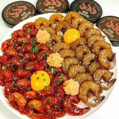 an assortment of donuts and sauces on a plate