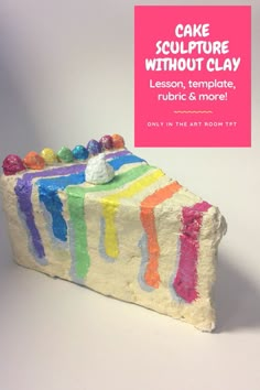 a piece of cake that has been made to look like it is painted with rainbows