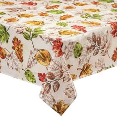 an image of a table cloth with autumn leaves on the top and bottom part of it