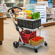 a shopping cart filled with vegetables and fruit in a grocery store's produce section