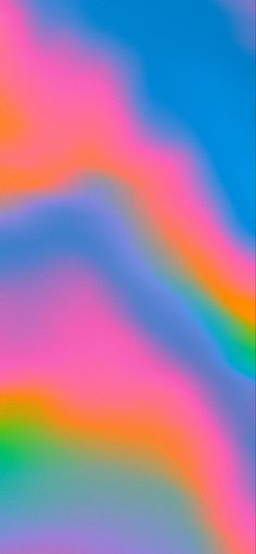 an abstract background with multicolored waves in blue, pink, green and yellow