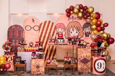 a harry potter birthday party with balloons and decorations