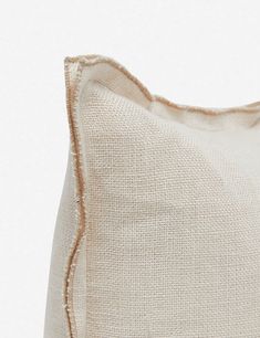 a close up of a pillow on a white background