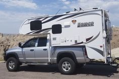 a truck with a camper attached to the back