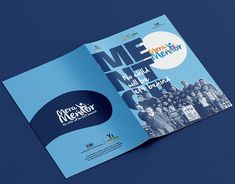 an open brochure with the words me and mentor written in blue on it