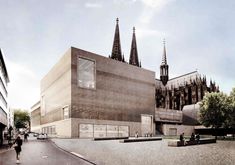 an artist's rendering of a building with spires in the background and people walking around