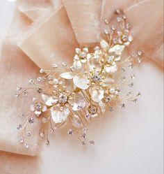 a bridal hair comb with pearls and crystals