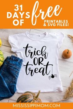 a white shirt with the words trick or treat on it next to some pumpkins