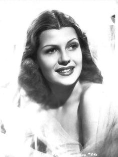 an old black and white photo of a woman