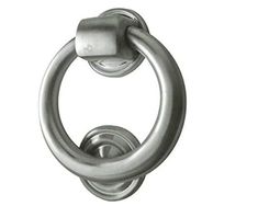 a metal door handle with an oval design on the front and side of it's ring