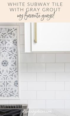 a white subway tile with gray grout in the kitchen